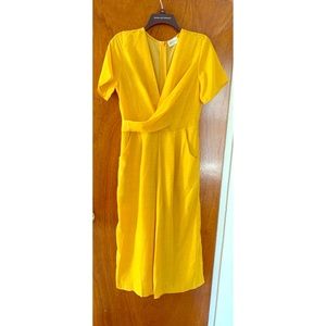 Culotte jumpsuit size L runs small.